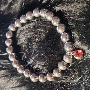 By Krafty_Korner Hand crafted beaded bracelet made on a stretchy cord